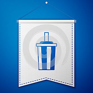 Blue Paper glass with drinking straw and water icon isolated on blue background. Soda drink glass. Fresh cold beverage