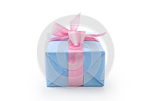 Blue paper present box with pink ribbon bow isolated on white background