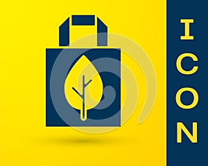 Blue Paper shopping bag with recycle icon isolated on yellow background. Bag with recycling symbol. Vector