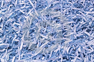 Blue paper strips from a shredder