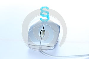 Blue paragraph symbol on computer mouse