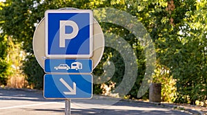 Blue parking sign in French autoroute roadside stop