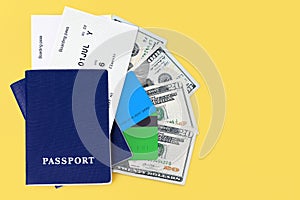 Blue passport, boarding pass, flight ticket, usa dollars, us cash money, american currency, travel, holidays, vacation, tourism