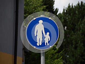 Blue Pedestrian Sign with Man and Child