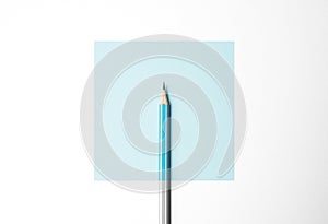 Blue pencil on white background, minimalism. Creativity, idea, solution, creativity concept