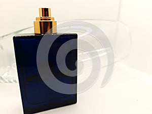 blue perfume bottle isolated on white