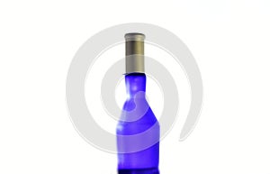 Blue perfume bottle isolated on a white background