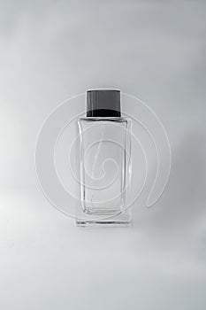 Blue perfume bottle on a white background