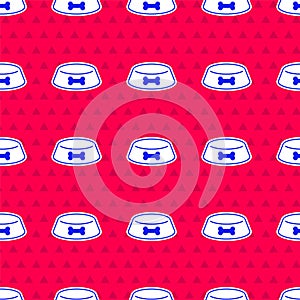 Blue Pet food bowl for cat or dog icon isolated seamless pattern on red background. Dog or cat paw print. Vector