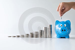 Blue piggy bank with coins bar graph, step up start up  business to success, Saving money for future plan and retirement fund