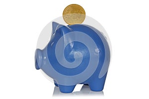 Blue piggy bank with fifty eurocents
