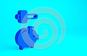 Blue Piggy bank and hammer icon isolated on blue background. Icon saving or accumulation of money, investment. Minimalism concept