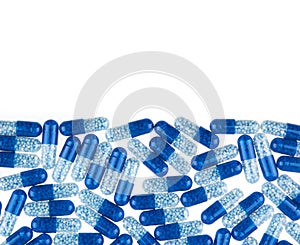 Blue pills isolated on white