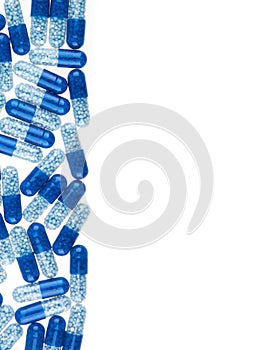 Blue pills isolated on white