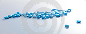 blue pills on white background