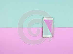 Blue and pink color on smart phone screen on colored background.