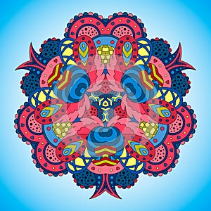 Blue-pink mandala on blue background.