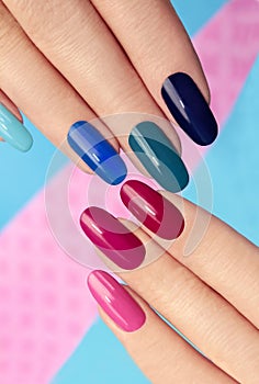 Blue pink nail Polish .