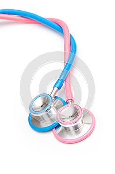 Blue and pink stethoscopes photo