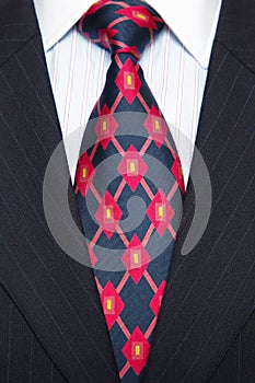 Blue Pinstripe suit and red/blue tie