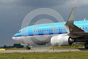 Blue plane taxiing photo