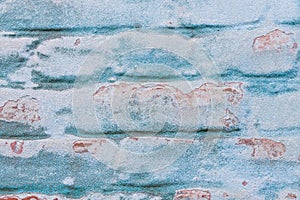 Blue plaster brick wall texture. Old retro building background copy space. Orange stones surface,detailed stone backdrop