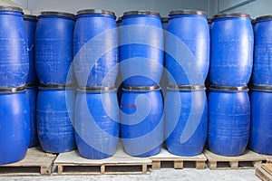 Blue Plastic barrels contain chemical inside