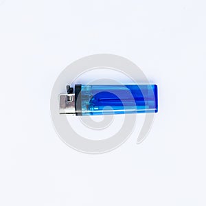 Blue plastic blank gas lighter. Gas lighter  on white background. Closeup shot, top view