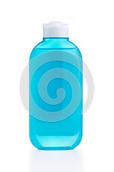 The blue plastic bottle with blue empty label isolated on white