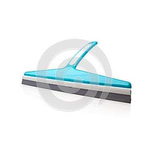 Blue plastic brush for cleaning windows. Silicone water drip isolated on white background.  Household products.