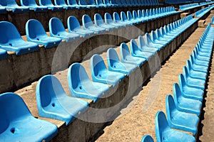 Blue plastic empty seats on stadium