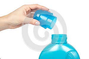 Blue plastic liquid detergent bottle with hand. Isolated on white background. Laundry container, merchandise template