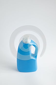 Blue plastic liquid detergent bottle isolated on white background. Laundry container, merchandise template. Product