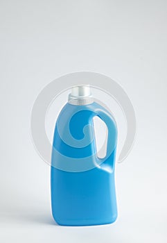 Blue plastic liquid detergent bottle isolated on white background. Laundry container, merchandise template. Product