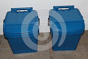 Blue Plastic Rubbish Bins.