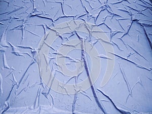The Blue Plastic sheet on the Car for dust and rain protection. photo
