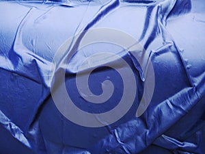 The Blue Plastic sheet on the Car for dust and rain protection. photo