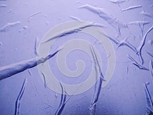 The Blue Plastic sheet on the Car for dust and rain protection. photo