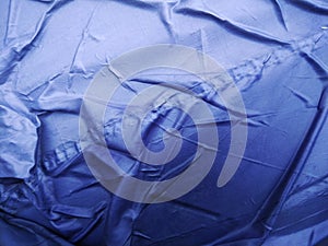 The Blue Plastic sheet on the Car for dust and rain protection. photo