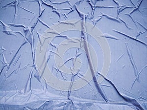 The Blue Plastic sheet on the Car for dust and rain protection. photo
