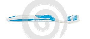 Blue plastic toothbrush