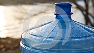 Close Up of Blue Plastic Water Gallon Showing Surface Texture and Embossed Details