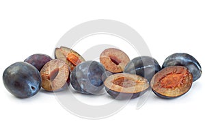 Blue plum fruit on white