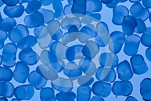 blue polymer resin granulate for background photo