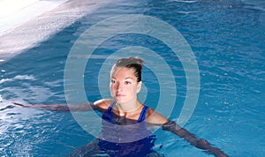 Blue pool woman beautiful swimming in water