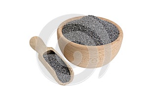 blue poppy seeds in wooden bowl and scoop isolated on white background. food ingredient