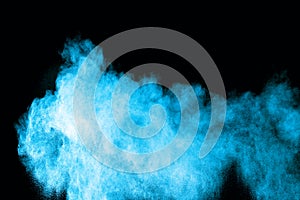 Blue powder splatted on white background.