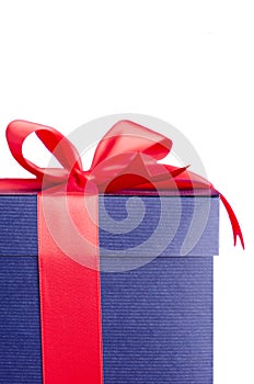 Blue present box with red ribbon isolated