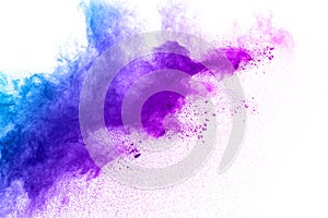 Blue-Purple color powder explosion cloud isolated on white background.