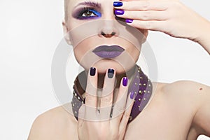 Blue purple fashion multicolored manicure and makeup .